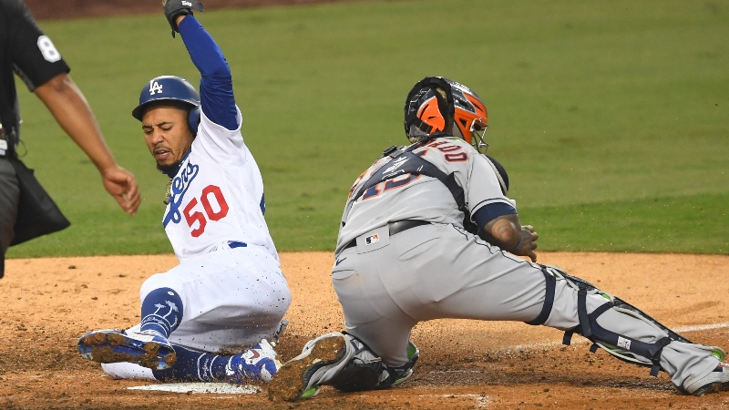 Los Angeles Dodgers right fielder Mookie Betts (50) and Houston Astros catcher Martin Maldonado (15)