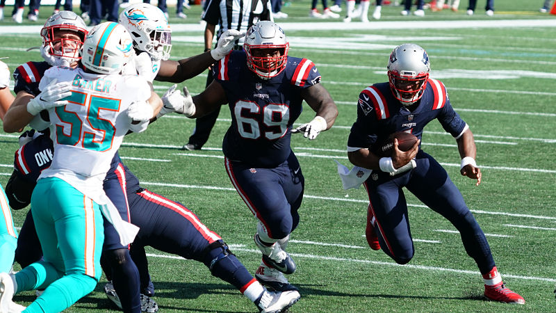 New England Patriots right guard Shaq Mason and quarterback Cam Newton