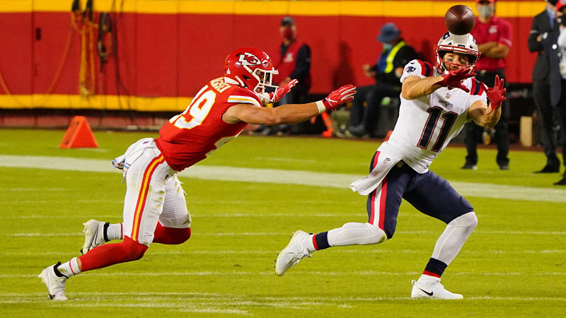 Kansas City Chiefs safety Daniel Sorensen and New England Patriots wide receiver Julian Edelman