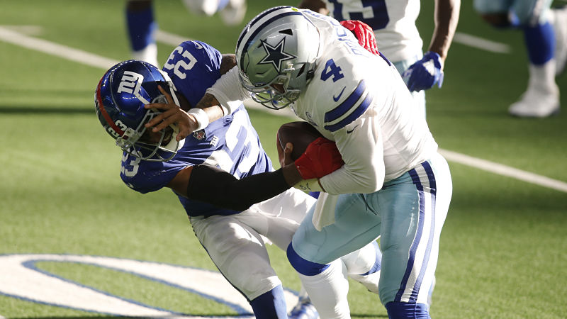 New York Giants cornerback Logan Ryan and Dallas Cowboys quarterback Dak Prescott