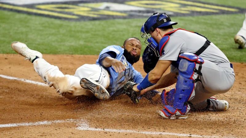 Los Angeles Dodgers catcher Austin Barnes, Tampa Bay Rays left fielder Manuel Margot