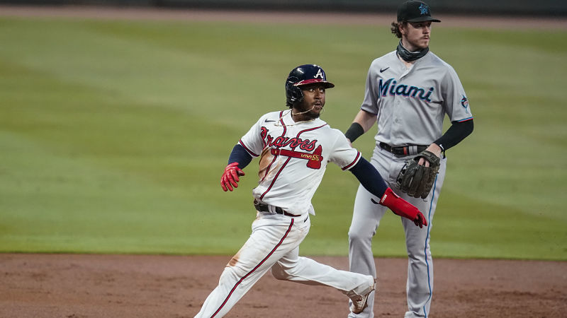 Atlanta Braves second baseman Ozzie Albies and Miami Marlins third baseman Brian Anderson