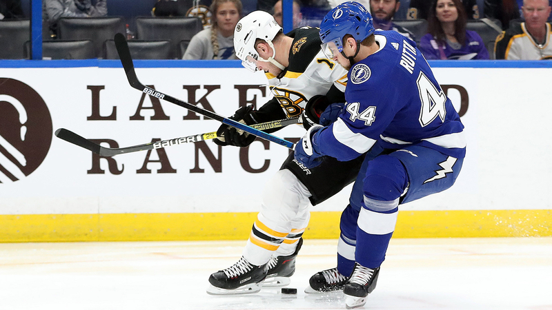 Tampa Bay Lightning defenseman Jan Rutta, Boston Bruins winger Chris Wagner
