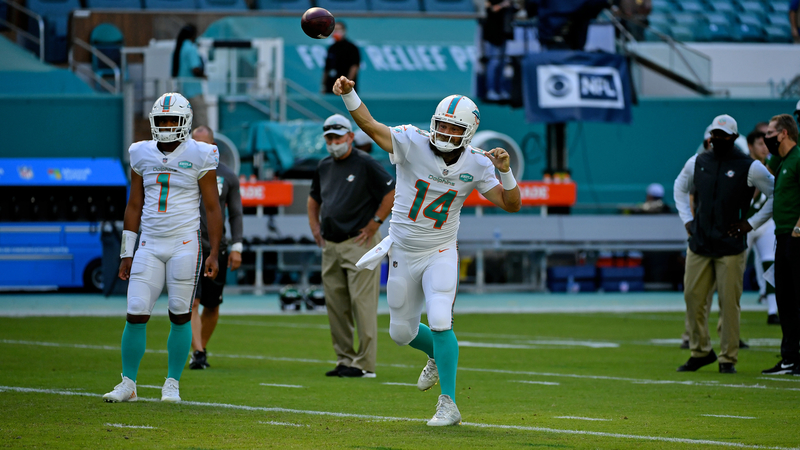Miami Dolphins quarterbacks Tua Tagovailoa, Ryan Fitzpatrick