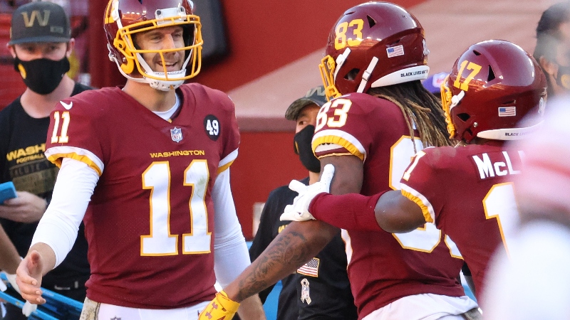 Washington Football Team quarterback Alex Smith (11) and teammates