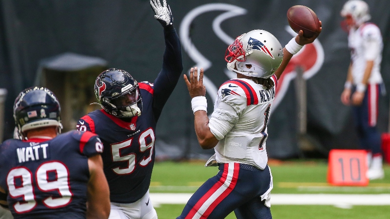 New England Patriots quarterback Cam Newton and Houston Texans outside linebacker Whitney Mercilus (59)