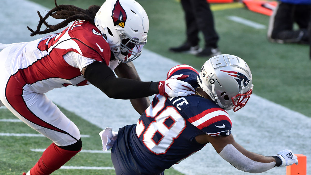 Arizona Cardinals linebacker DeVondre Campbell and New England Patriots running back James White