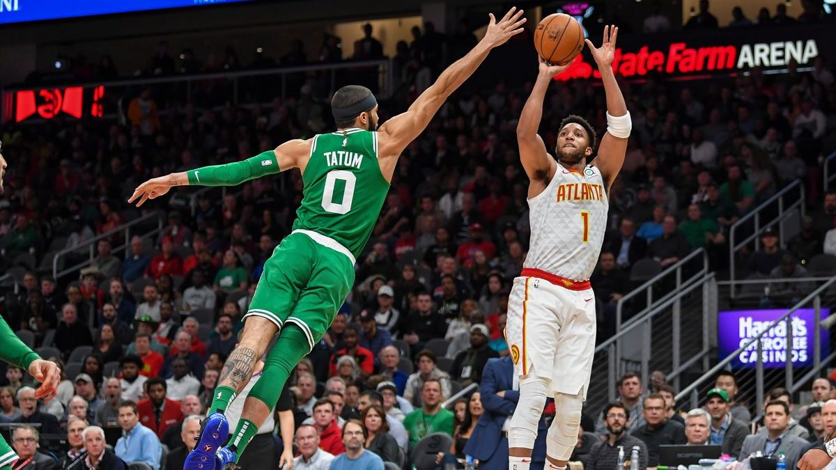 Boston Celtics wing Jayson Tatum, assistant coach Evan Turner