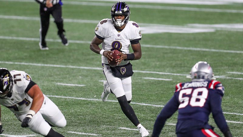 Baltimore Ravens quarterback Lamar Jackson and New England Patriots linebacker Anfernee Jennings