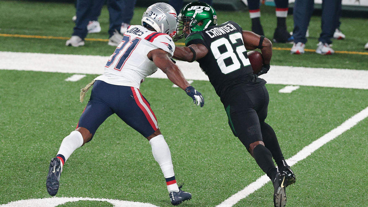 New England Patriots defensive back Jonathan Jones and New York Jets wide receiver Jamison Crowder