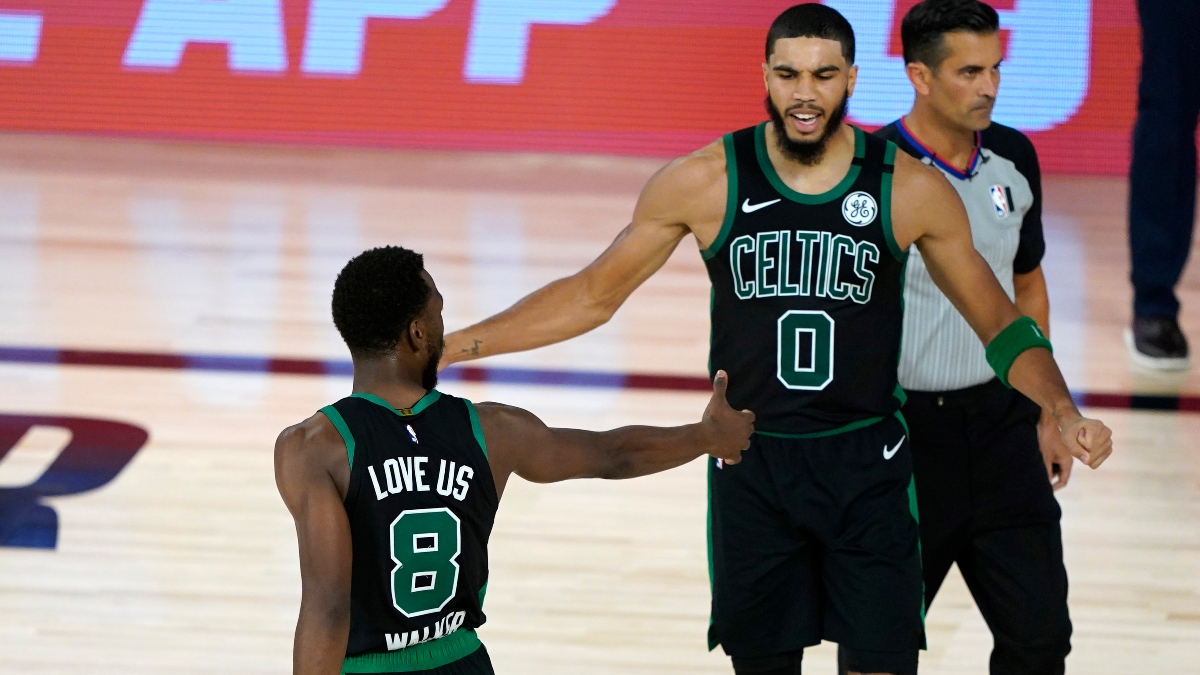Boston Celtics guard Kemba Walker (left) and forward Jayson Tatum