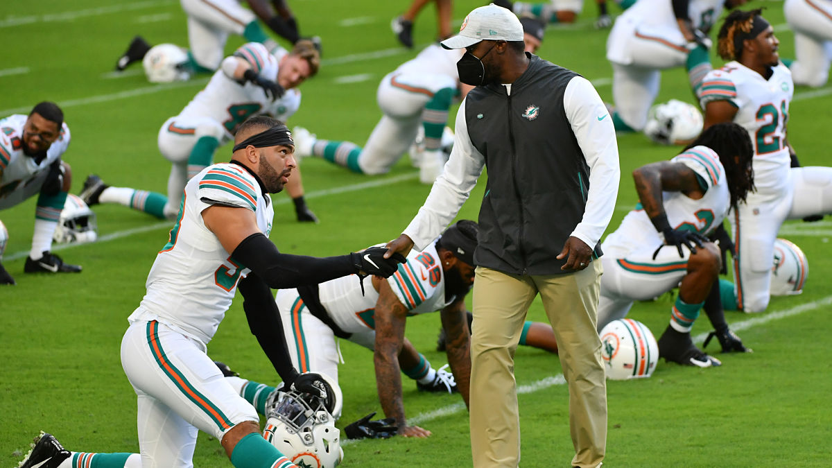 Miami Dolphins linebacker Kyle Van Noy and head coach Brian Flores