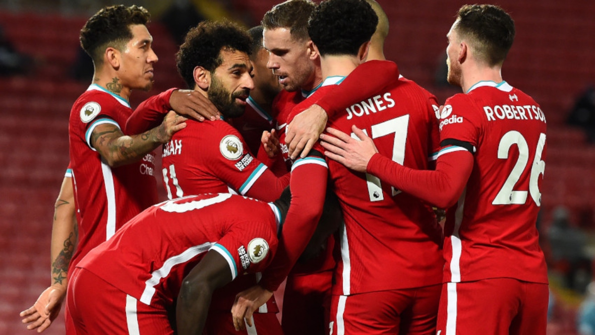 Liverpool midfielder Mohamed Salah (11) and teammates