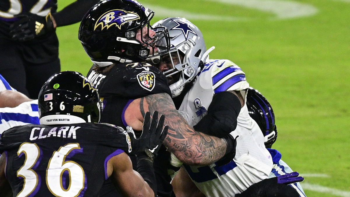 Baltimore Ravens defensive end Derek Wolfe and Dallas Cowboys running back Ezekiel Elliott