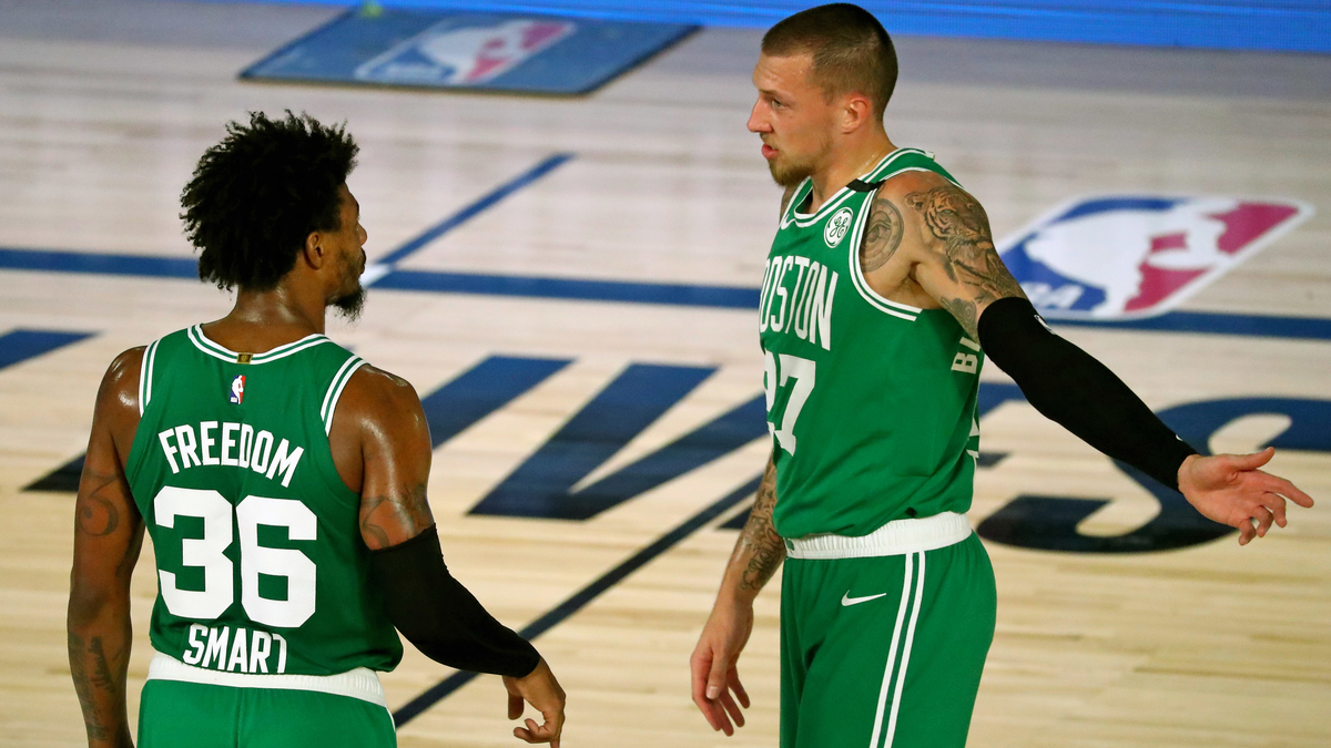 Boston Celtics center Daniel Theis, guard Marcus Smart