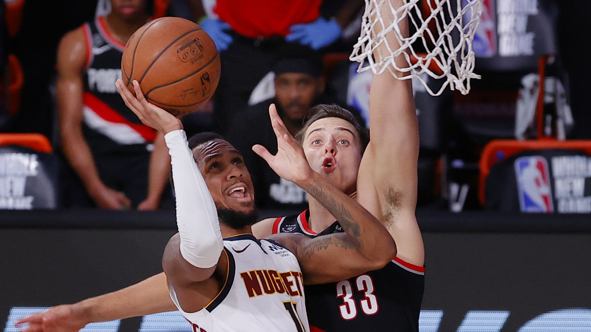 Denver Nuggets point guard Monte Morris and Portland Trail Blazers forward Zach Collins