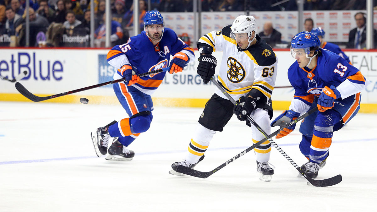 Boston Bruins wing Brad Marchand and New York Islanders center Mathew Barzal