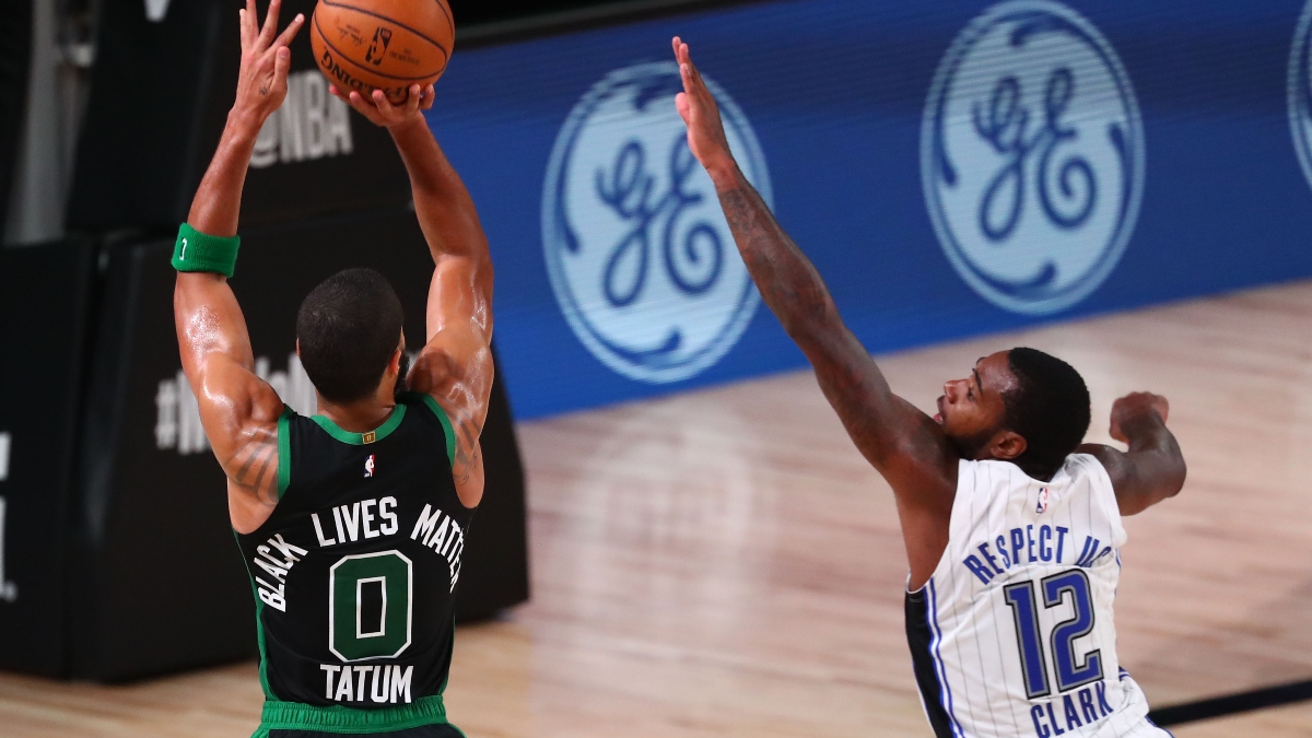 Boston Celtics forward Jayson Tatum and Orlando Magic forward Gary Clark