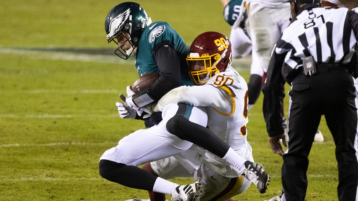 Philadelphia Eagles quarterback Nate Sudfeld and Washington Football Team defensive lineman Montez Sweat
