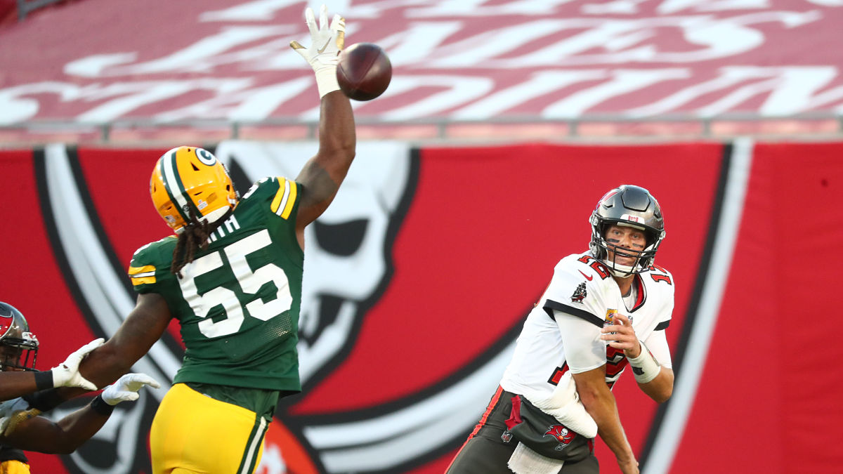 Green Bay Packers linebacker Za'Darius Smith and Tampa Bay Buccaneers quarterback Tom Brady