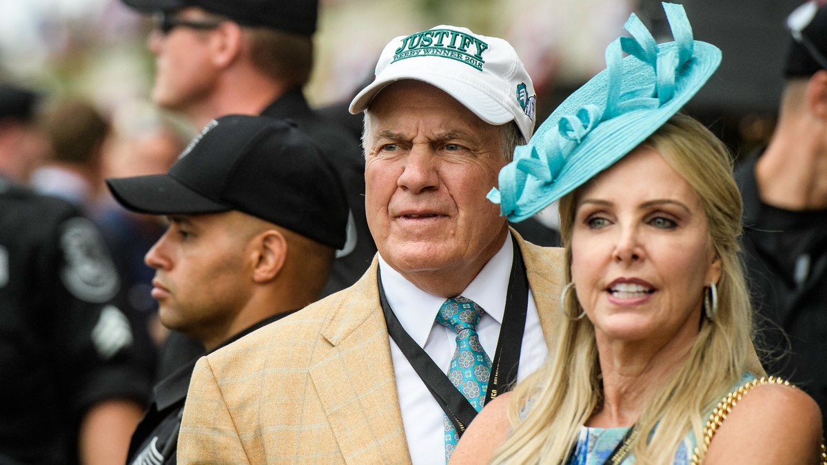 New England Patriots head coach Bill Belichick, girlfriend Linda Holliday