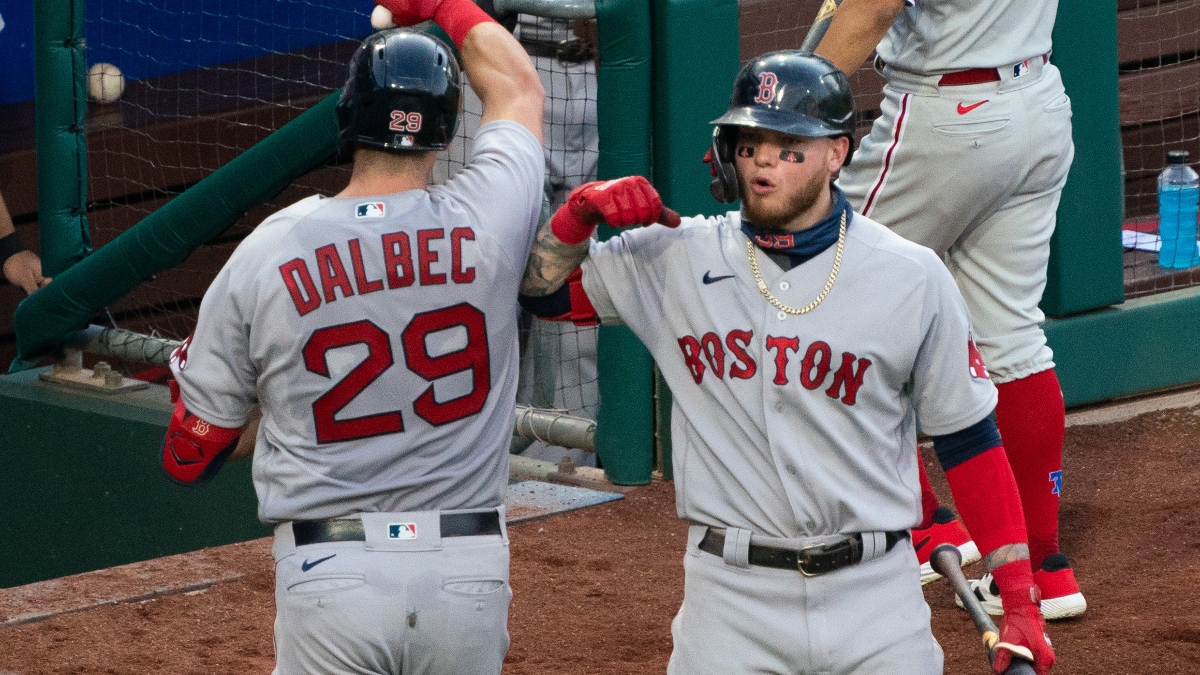 Boston Red Sox third baseman Bobby Dalbec (29) and outfielder Alex Verdugo (99)