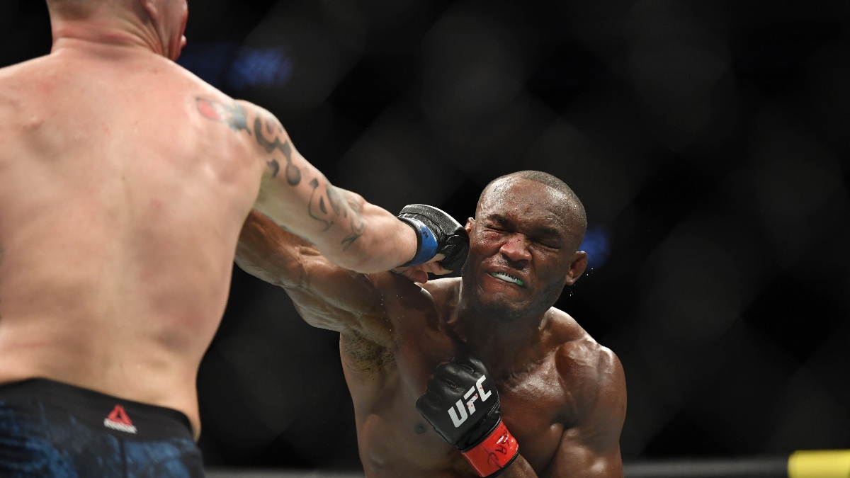 UFC Fighter Kamaru Usman (red gloves) and Colby Covington (blue gloves)