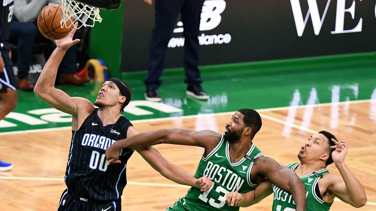Orlando Magic forward Aaron Gordon and Boston Celtics forwards Tristan Thompson and Grant Williams