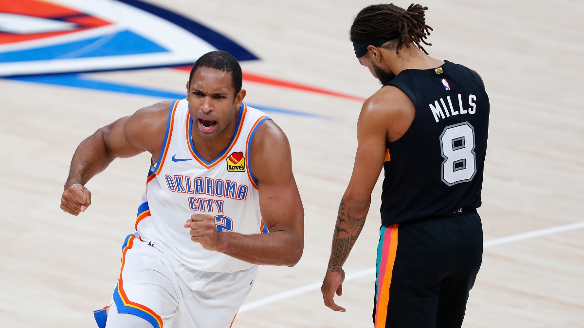 Oklahoma City Thunder center Al Horford (42) and San Antonio Spurs guard Patty Mills (8)