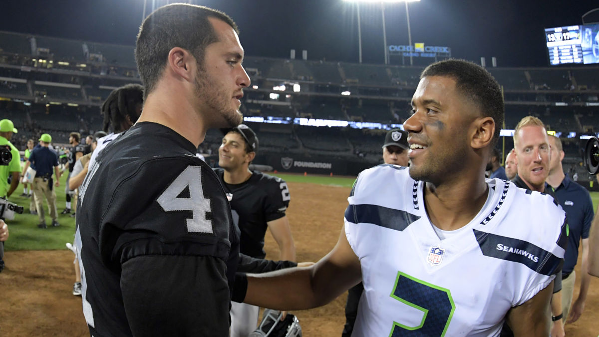 Las Vegas Raiders quarterback Derek Carr and Seattle Seahawks quarterback Russell Wilson