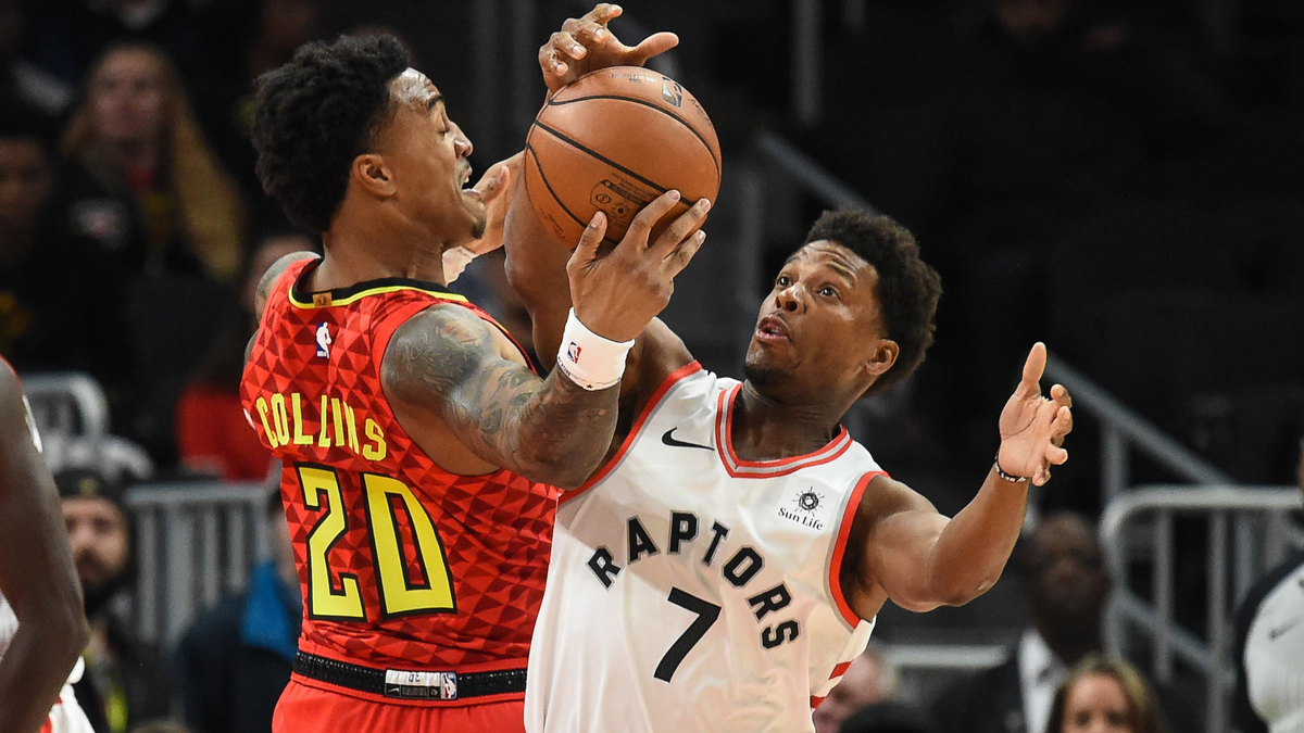 Toronto Raptors guard Kyle Lowry, Atlanta Hawks forward John Collins