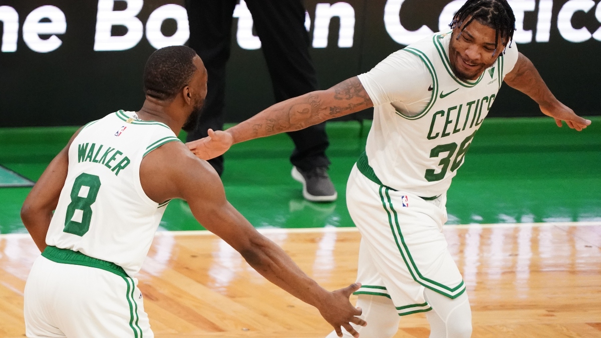 Boston Celtics guards Kemba Walker (8) and Marcus Smart (36)