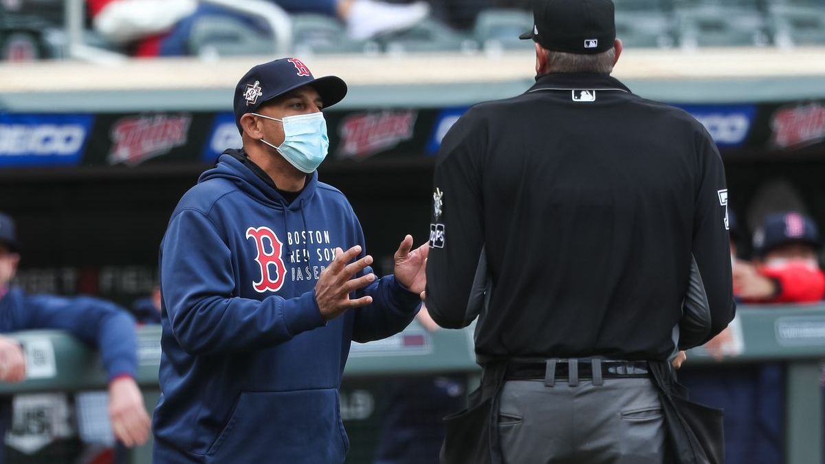 Boston Red Sox manager Alex Cora, MLB Umpire Jordan Baker