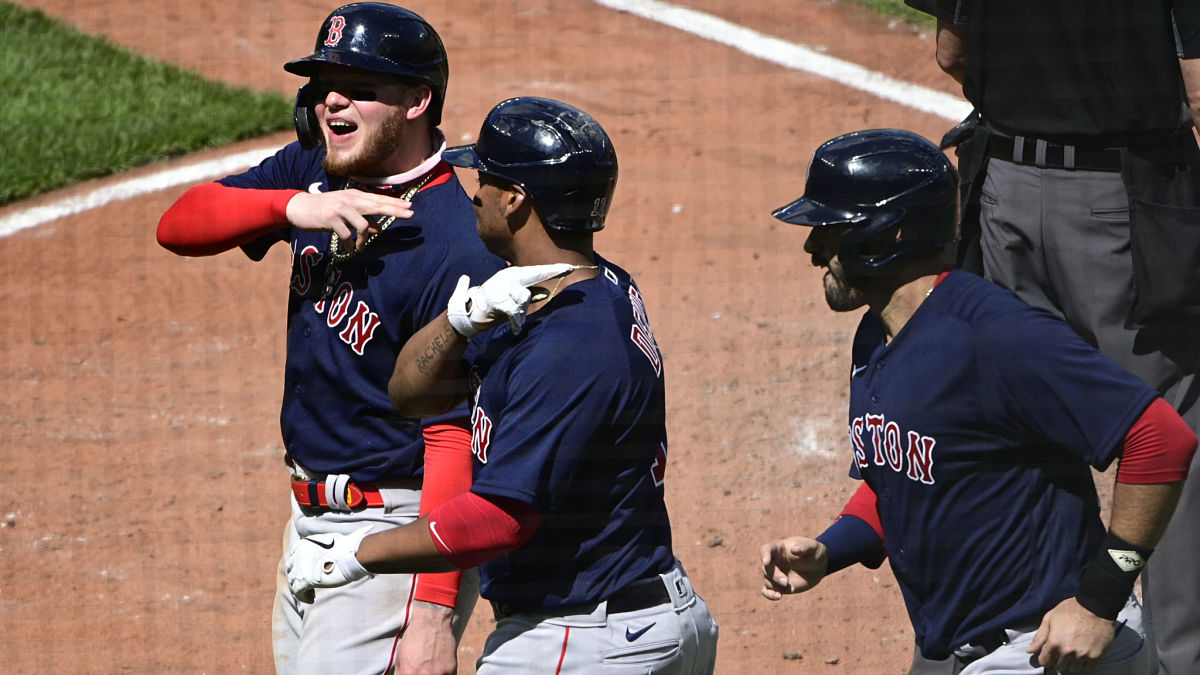 Boston Red Sox outfielder Alex Verdugo, third baseman Rafael Devers and designated hitter J.D. Martinez