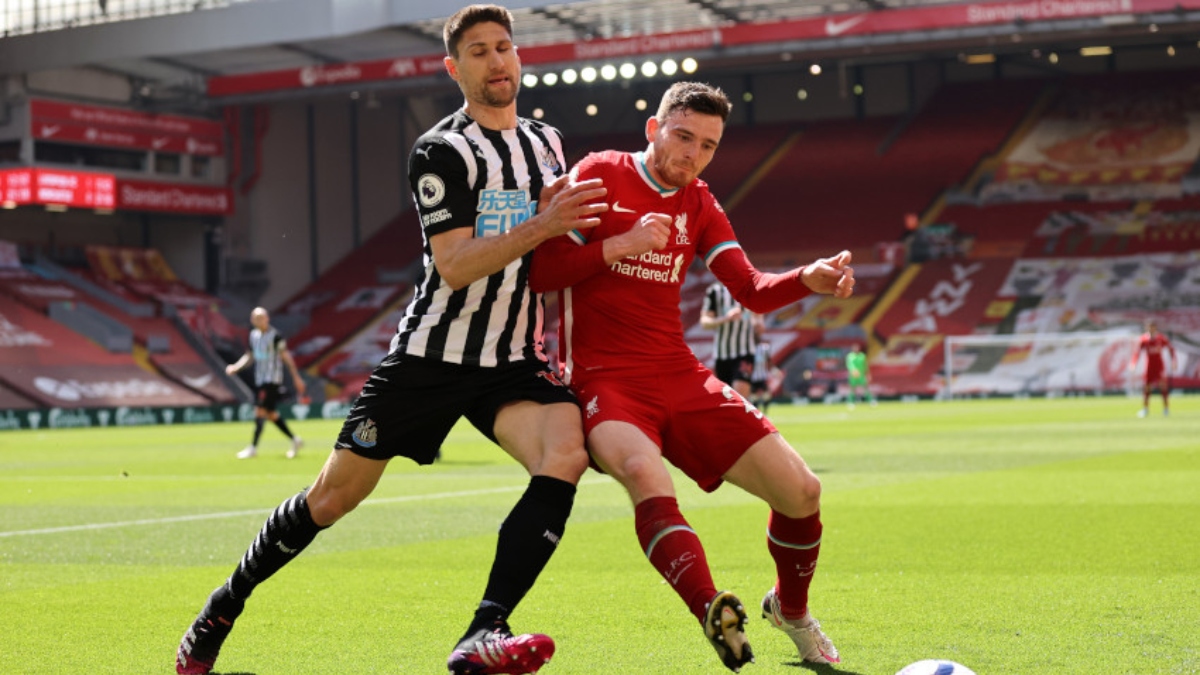 Liverpool defender Andrew Robertson (right) and a Newcastle player