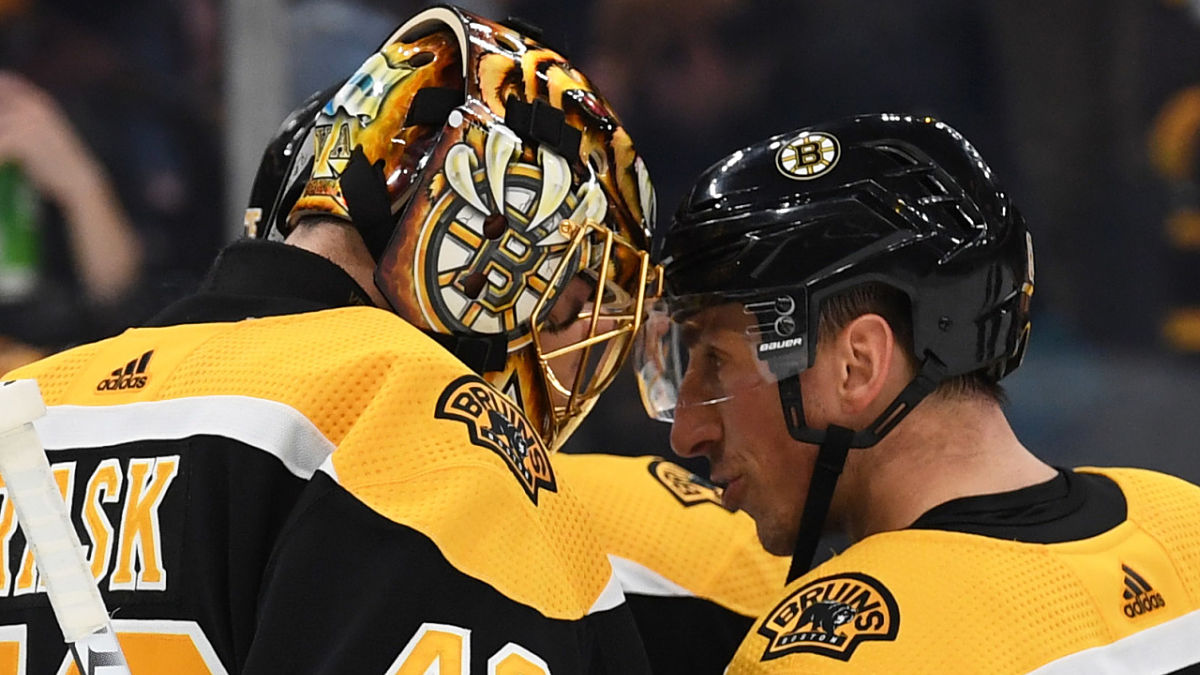 Boston Bruins winger Brad Marchand, goalie Tuukka Rask