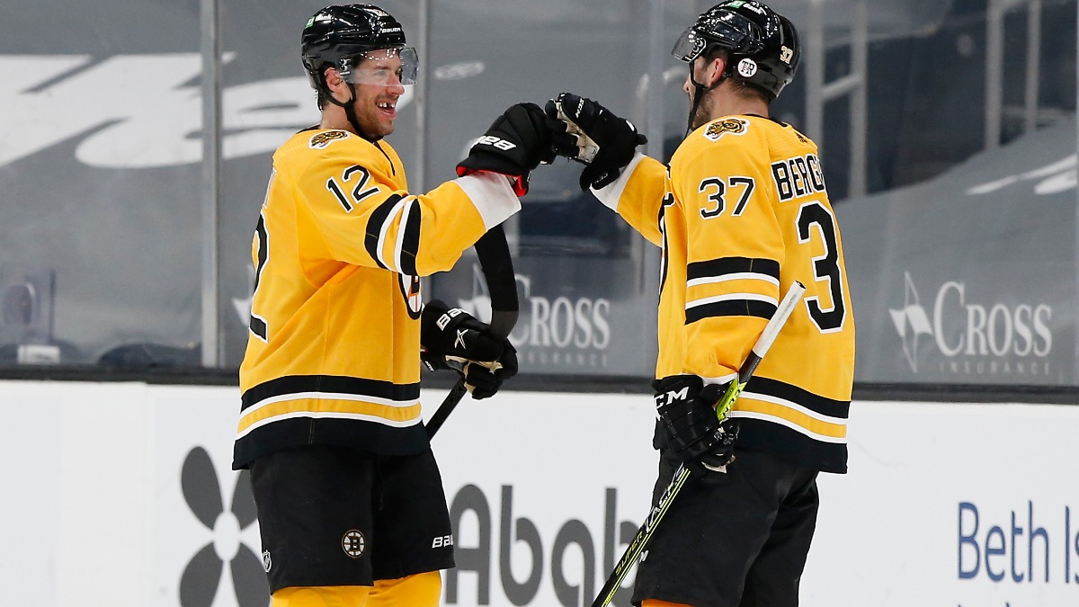 Boston Bruins Forward Craig Smith and Patrice Bergeron