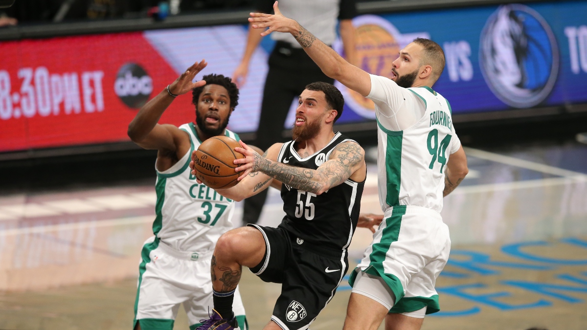 Brooklyn Nets forward Mike James (55), Boston Celtics power forward Semi Ojeleye (37) and shooting guard Evan Fournier (94)