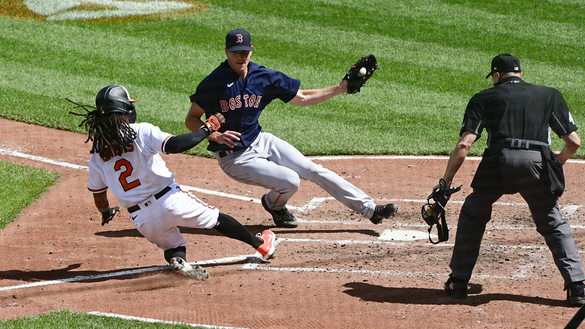 Baltimore Orioles shortstop Freddy Galvis and Boston Red Sox pitcher Nick Pivetta