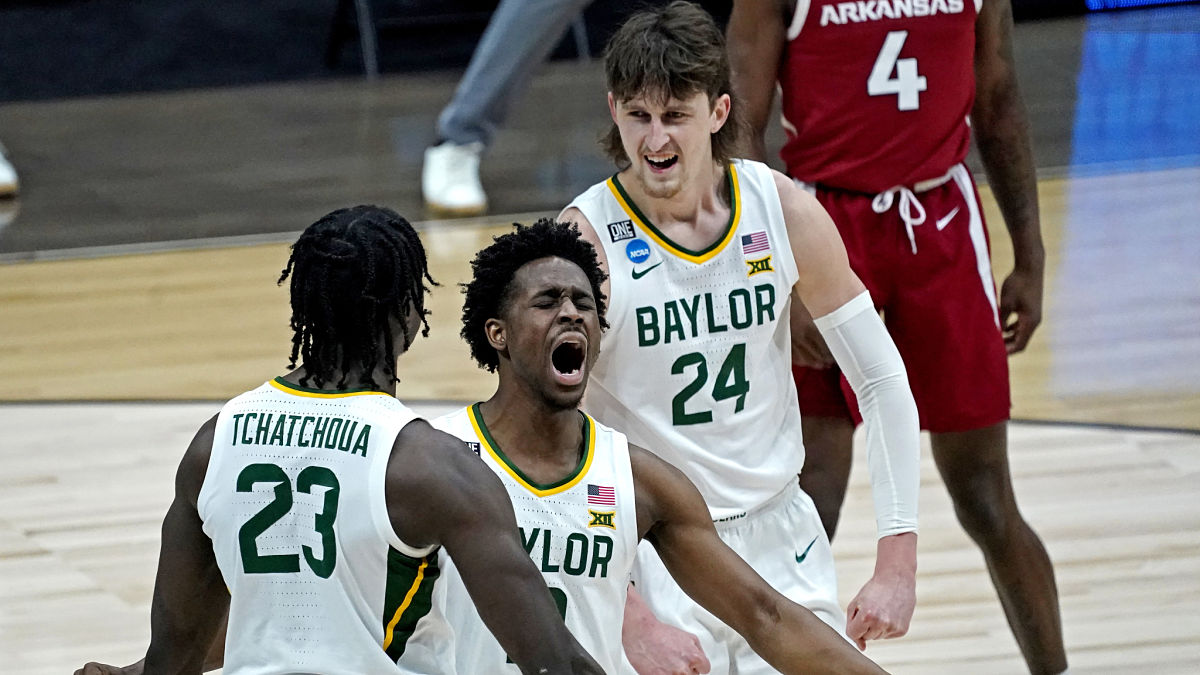 Baylor Bears forward Jonathan Tchamwa Tchatchoua and guards Adam Flagler and Matthew Mayer