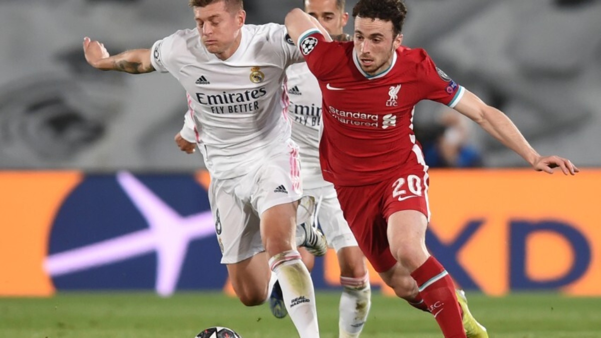 Real Madrid midfielder Toni Kross (left) and Liverpool forward Diogo Jota