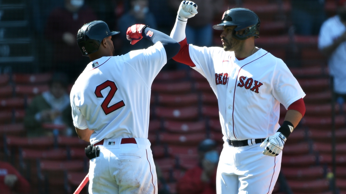 Boston Red Sox shortstop Xander Bogaerts (2) and designated hitter J.D. Martinez (28)