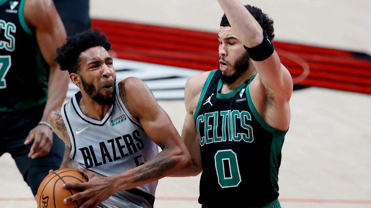 Portland Trail Blazers small forward Derrick Jones Jr. and Boston Celtics small forward Jayson Tatum
