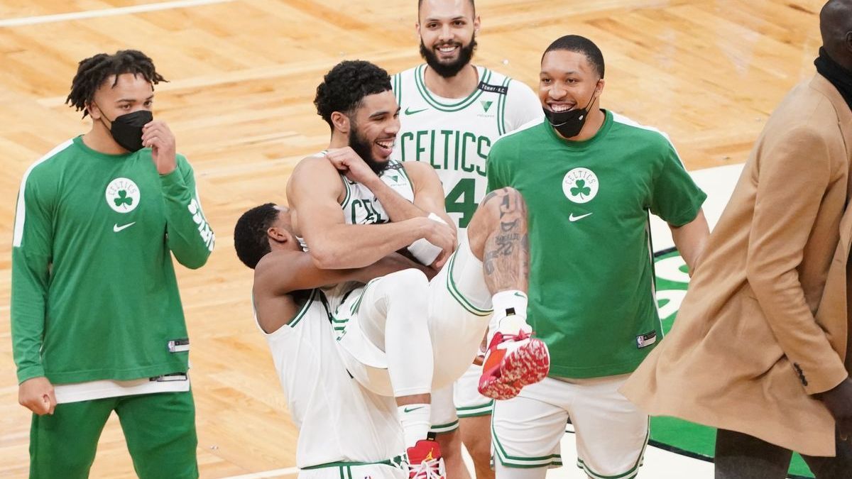 Boston Celtics players Carsen Edwards, Tristan Thompson, Jayson Tatum, Grant Williams, Evan Fournier