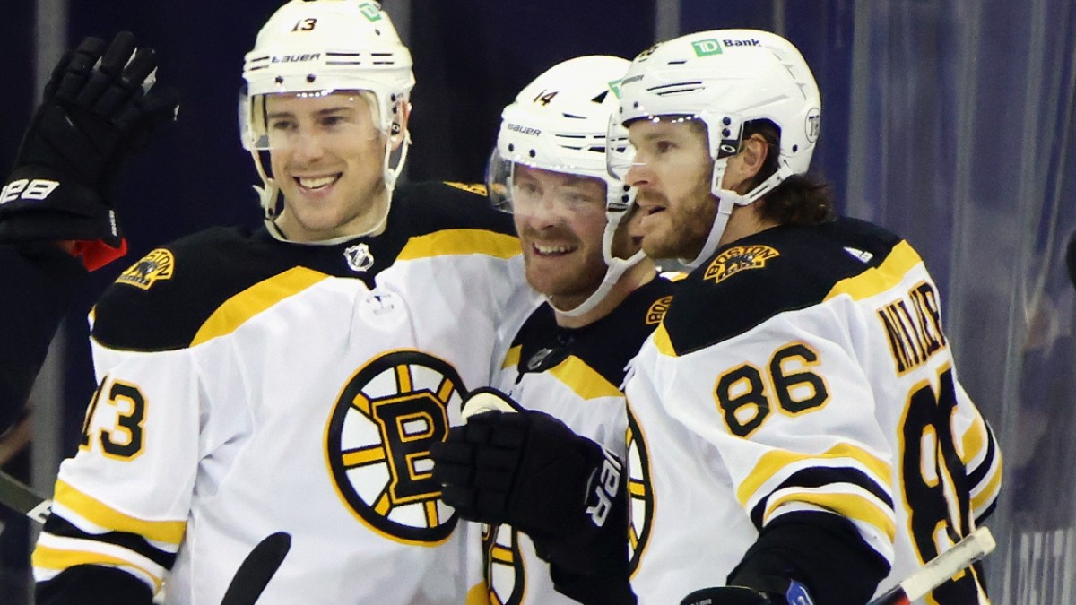 Boston Bruins forwards Charlie Coyle and Chris Wagner, defenseman Kevan Miller