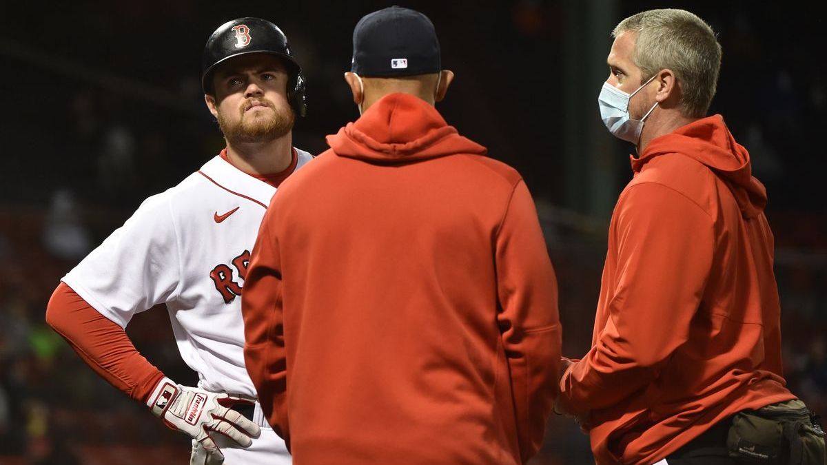 Boston Red Sox infielder Christian Arroyo, manager Alex Cora,