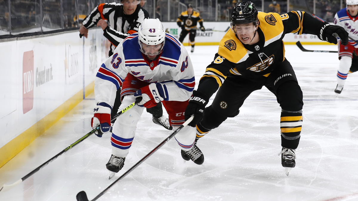 Boston Bruins defenseman Mike Reilly, New York Rangers forward Colin Blackwell