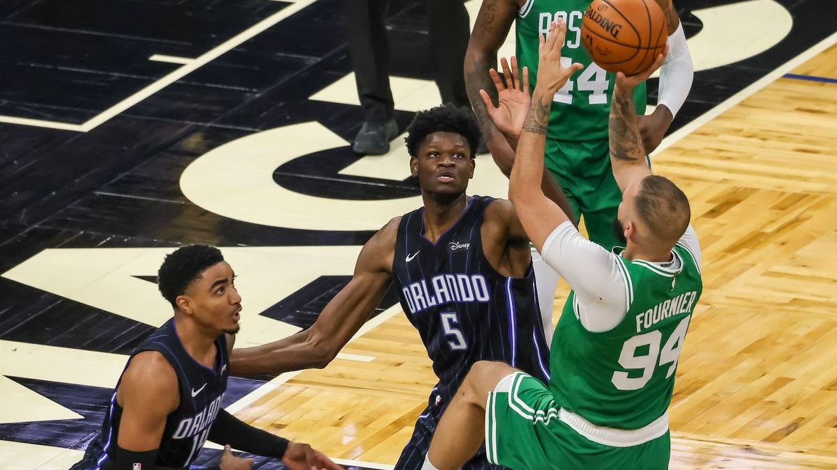 Boston Celtics' Evan Fournier, Orlando Magic's Mo Bamba, Gary Harris