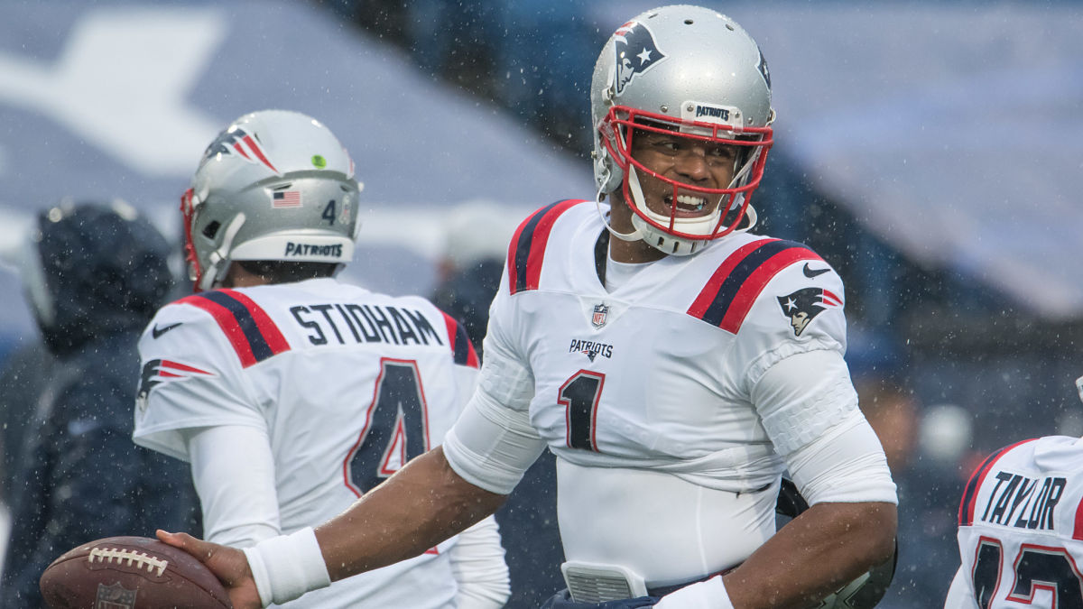 New England Patriots quarterbacks Jarrett Stidham and Cam Newton