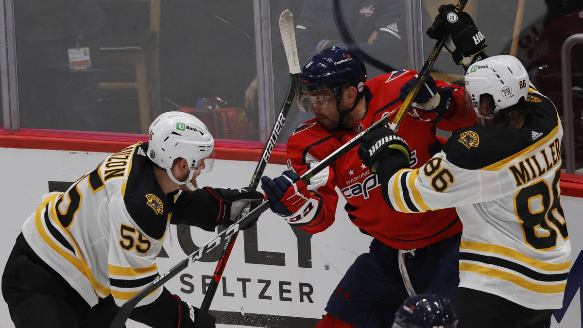 Boston Bruins defensemen Kevan Miller and Jeremy Lauzon, Washington Capitals winger Alex Ovechkin